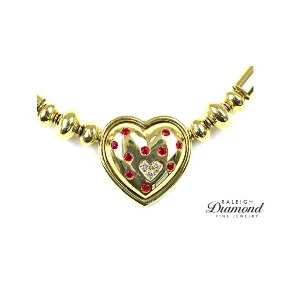 Estate 18K Yellow Gold Faraone Mannella Ruby Heart Pendant with Assorted Necklace Raleigh Diamond Fine Jewelry Raleigh, NC