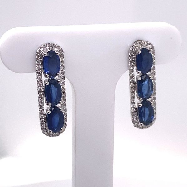 14K WHITE GOLD SAPPHIRE AND DIAMOND EARRINGS CONTAINING 74 ROUND FULL CUT DIAMONDS = .18CT AND 6 OVAL BLUE SAPPHIRES WEIGHING A  Rasmussen Diamonds Mount Pleasant, WI
