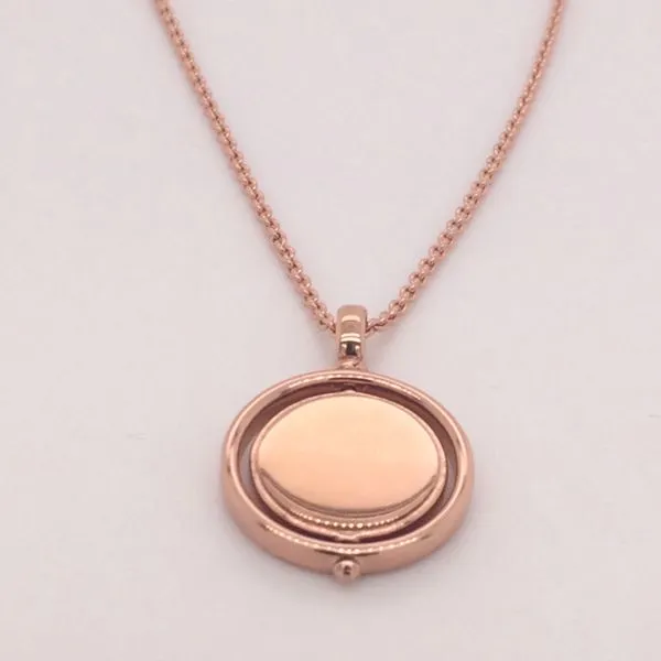 Sterling Silver and Rose Gold plate, round spinner necklace  Rasmussen Diamonds Mount Pleasant, WI