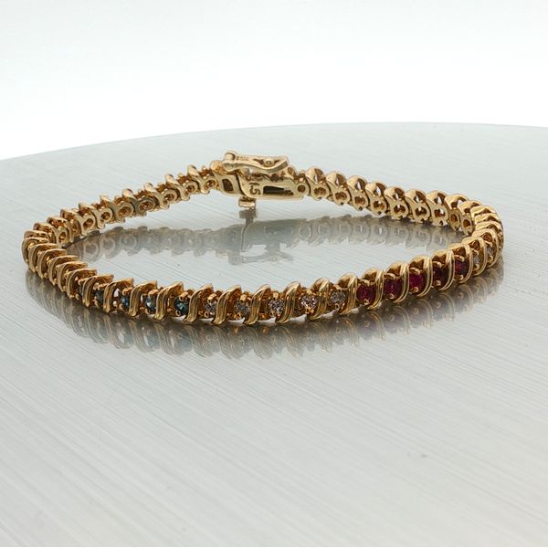 14K Yellow Gold Tennis Bracelet with Round Cut Red Rubies, Blue Sapphires, and White Diamonds Rich Custom Jewelry Las Vegas, NV