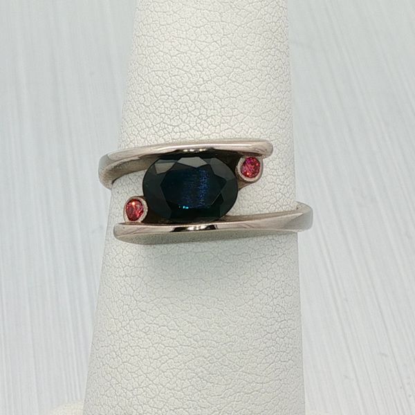 Rich Custom Jewelry Contemporary 14K White Gold Open Channel Ring Featuring a Deep Blue Sapphire and Pink Diamonds Rich Custom Jewelry Las Vegas, NV