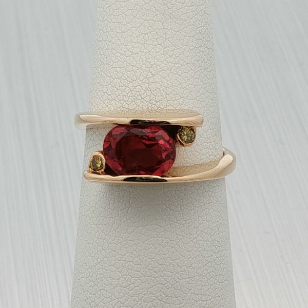 Rich Custom Jewelry Contemporary 14K Yellow Gold Open Channel Ring Featuring a Vibrant Pink Tourmaline and Yellow Diamonds Rich Custom Jewelry Las Vegas, NV