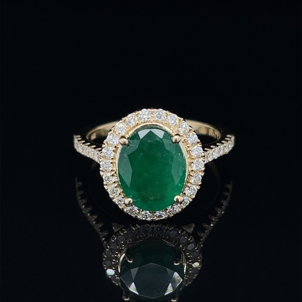 14 Karat Yellow Gold Oval Emerald and Diamond Halo Ring Robert Irwin Jewelers Memphis, TN