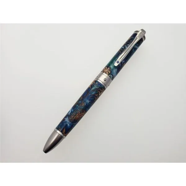 Chablis pine cone green & blue acrylic, with Mokune Gane and sapphire pen Roberts Jewelers Jackson, TN