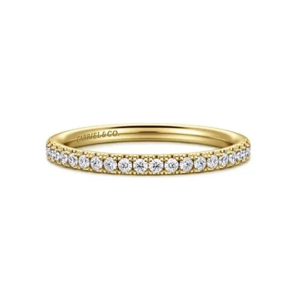 Stunning straight line diamond band featured in yellow gold. Root Jewelers Medford, OR