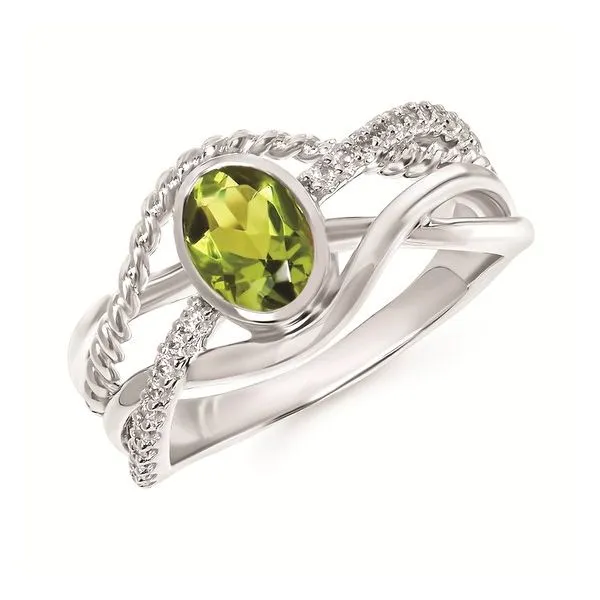 By pass ring with diamonds swirling by a Peridot center Root Jewelers Medford, OR