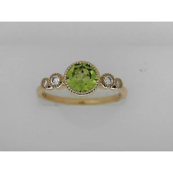 Bezel Set Peridot Ring Sam Dial Jewelers Pullman, WA