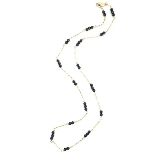 Black Spinel and Yellow Gold