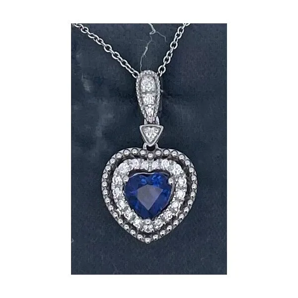 NATURAL HEART-SHAPED SAPPHIRE AND DIAMOND HALO PENDANT Sam Dial Jewelers Pullman, WA