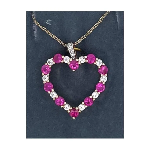 YELLOW GOLD NATURAL RUBY & WHITE SAPPHIRE HEART PENDANT Sam Dial Jewelers Pullman, WA