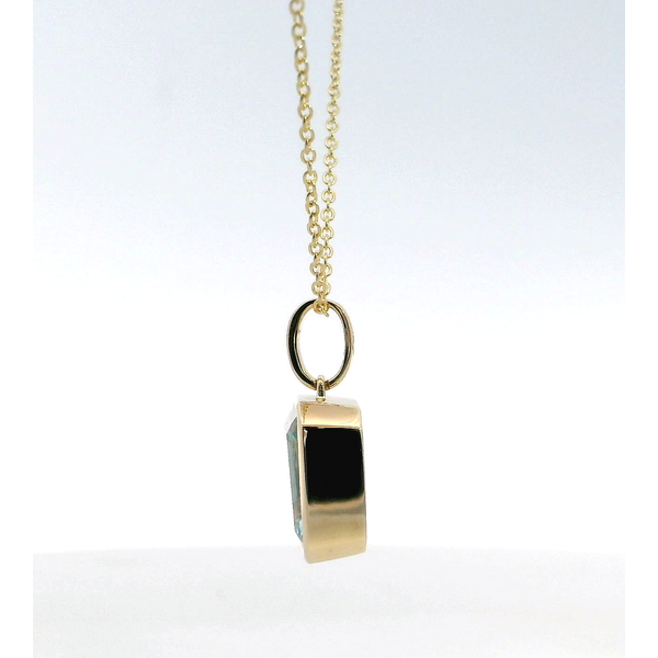 18K YG Blue Topaz Emerald Cut Bezel Pendant Image 2 Saxons Fine Jewelers Bend, OR