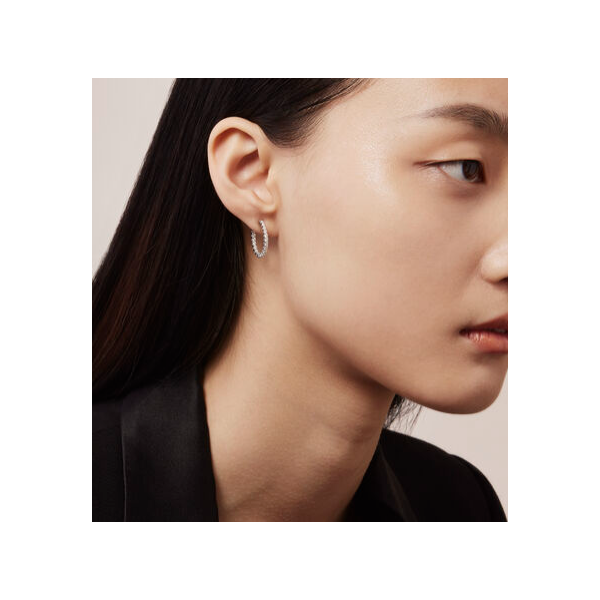 Hearts on Fire. 18 Karat White Gold Diamond Signature Oval Small Hoops Image 2 Saxons Fine Jewelers Bend, OR