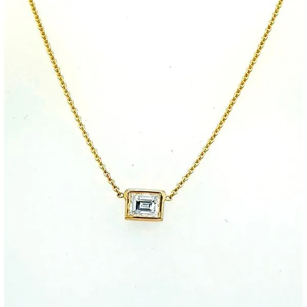 Saxons. Yellow Gold Diamond Step Cut Baguette Saxons Fine Jewelers Bend, OR