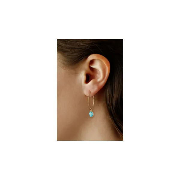 14 Karat Yellow Gold Blue Topaz Bezel Set Simple Sweep Earrings Image 2 Saxons Fine Jewelers Bend, OR