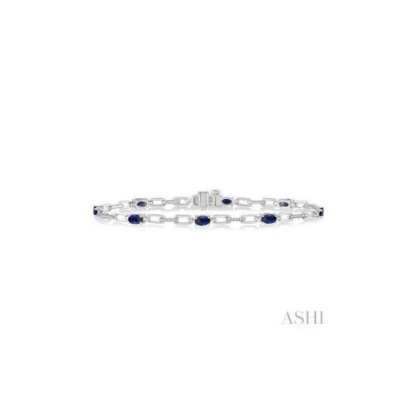 10kt White Gold Round Cut Diamond & 5x3 MM Oval Cut Sapphire Precious Bracelet .14tcw Steve Lennon & Co Jewelers  New Hartford, NY