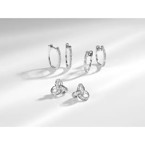 White Gold Diamond Oval Shaped Huggie Earrings Image 2 SVS Fine Jewelry Oceanside, NY