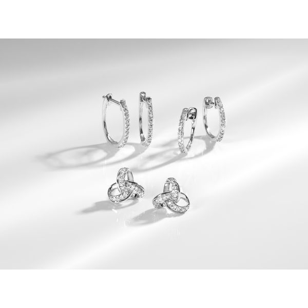 White Gold Diamond Oval Shaped Huggie Earrings Image 2 SVS Fine Jewelry Oceanside, NY
