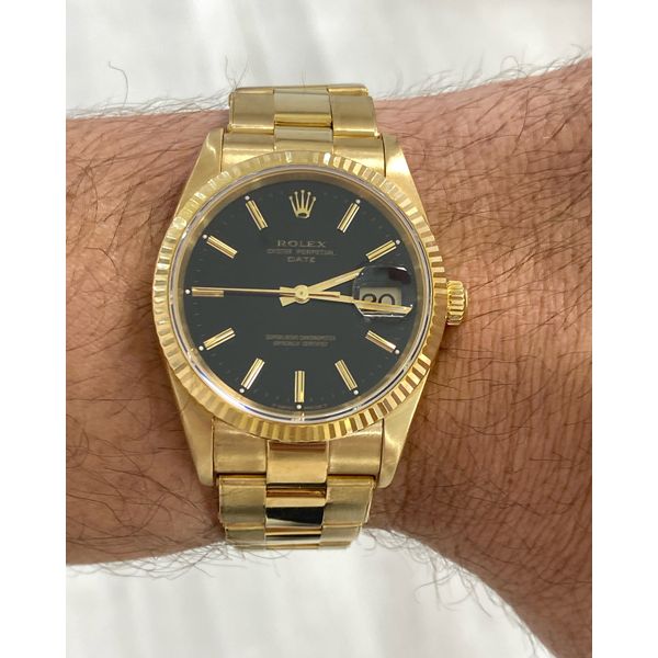 Pre-Owned Rolex Date 15238 18K Yellow Gold Black Dial Fluted Bezel 34mm SVS Fine Jewelry Oceanside, NY