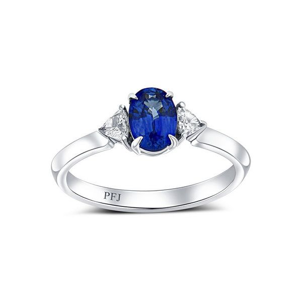 18KT WHITE GOLD RING WITH 0.81CT MONTANA BLUE SAPPHIRE AND 2 - 0.16 TCW TRILLIAN ACCENT DIAMONDS  SIZE 6.75 Taylors Jewellers Alliston, ON