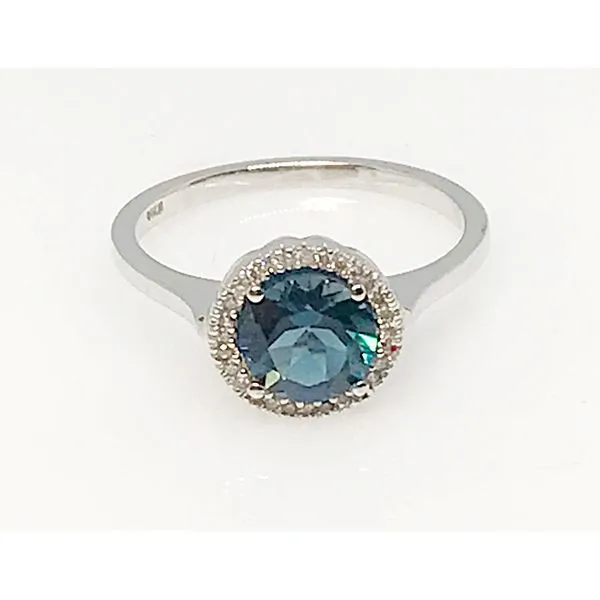 14K White Gold Blue Topaz Halo Ring Tena's Fine Diamonds and Jewelry Elberton, GA