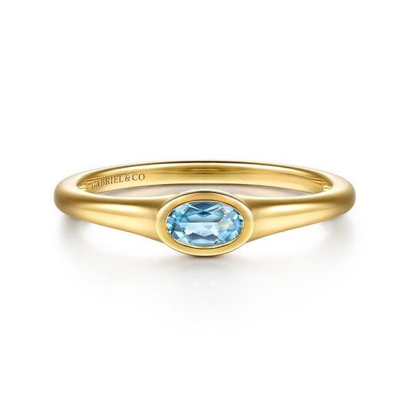 Lady's Yellow 14K Fashion Ring Size 6.5 With 0.27Twt Oval Blue Topaz Texas Gold Connection greenville, TX