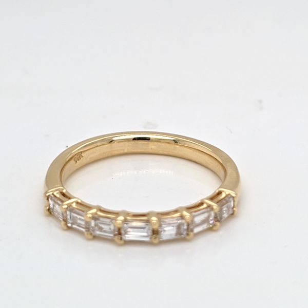 14kt YG .72ct TW LG Emerald Cut Diamond Band Carroll's Jewelers Doylestown, PA