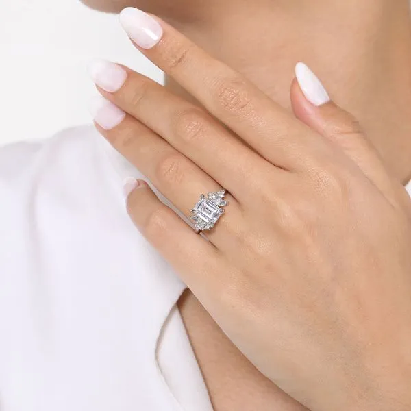 Emerald cut side cluster engagement ring mounting