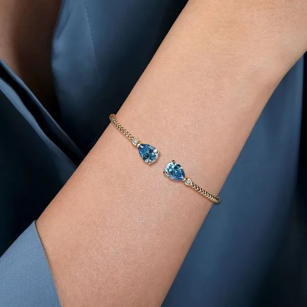 14kt YG Blue Topaz and Diamond Bracelet