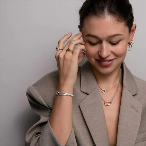 SS/GP CZ Huggie Earrings Image 3 Carroll's Jewelers Doylestown, PA