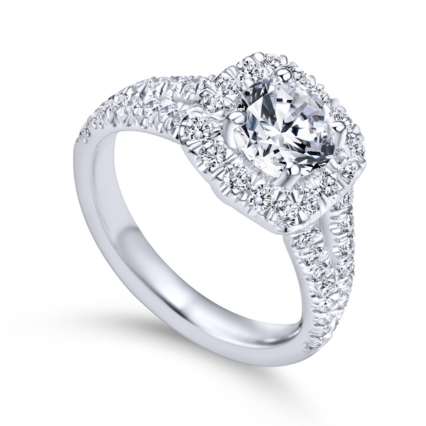 Diamond rows split toward the lavish halo in this white gold engagement ring The Ring Austin Round Rock, TX