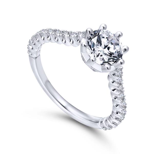 Accent diamonds are set into a slim, scalloped white gold band The Ring Austin Round Rock, TX