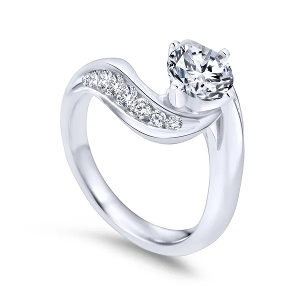 Tapered channels of graduated round diamonds amp up the sparkle in this white gold bypass engagement ring The Ring Austin Round Rock, TX