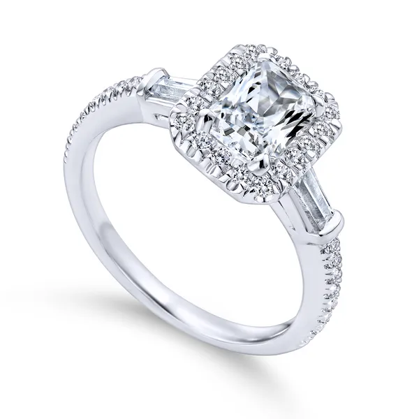 Emerald cut diamond engagement ring is enhanced by a pave diamond halo The Ring Austin Round Rock, TX