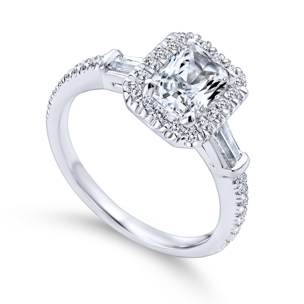 Emerald cut diamond engagement ring is enhanced by a pave diamond halo The Ring Austin Round Rock, TX