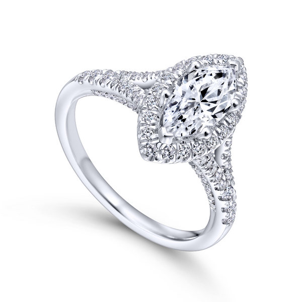 Marquise cut stunner boasts a complementary diamond halo atop an elegant split shank pave diamond band The Ring Austin Round Rock, TX
