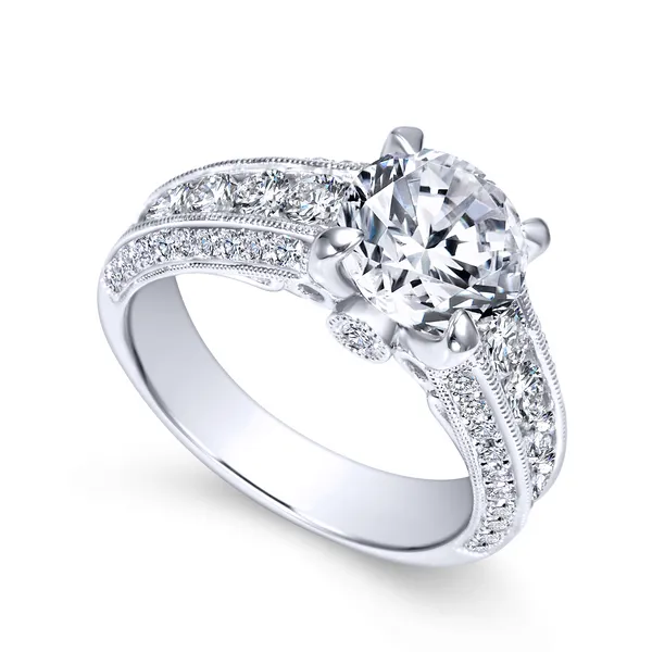 Your centerstone is surrounded by the brightest diamonds that are nestled in a white gold channel and is enhanced by a surprise bridge underneath The Ring Austin Round Rock, TX