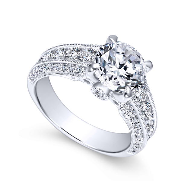 Your centerstone is surrounded by the brightest diamonds that are nestled in a white gold channel and is enhanced by a surprise  The Ring Austin Round Rock, TX