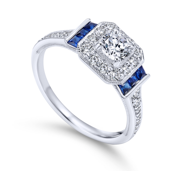Victorian styled engagement ring, is perfectly accented with three princess cut sapphire side stones on each side The Ring Austin Round Rock, TX
