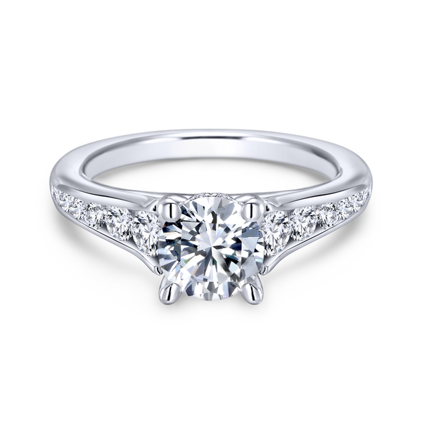 Channel of tapering round diamonds leads the eye right to your gorgeous center stone in this modern white gold engagement ring Image 2 The Ring Austin Round Rock, TX