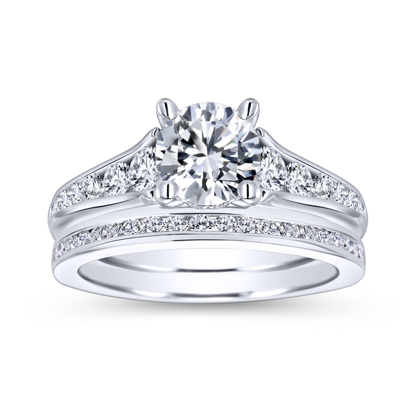 Channel of tapering round diamonds leads the eye right to your gorgeous center stone in this modern white gold engagement ring Image 4 The Ring Austin Round Rock, TX