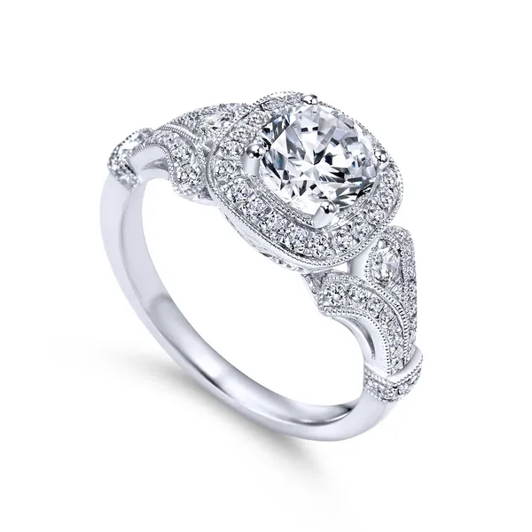 Diamond halo center stone is accented by ornate vintage detailing The Ring Austin Round Rock, TX