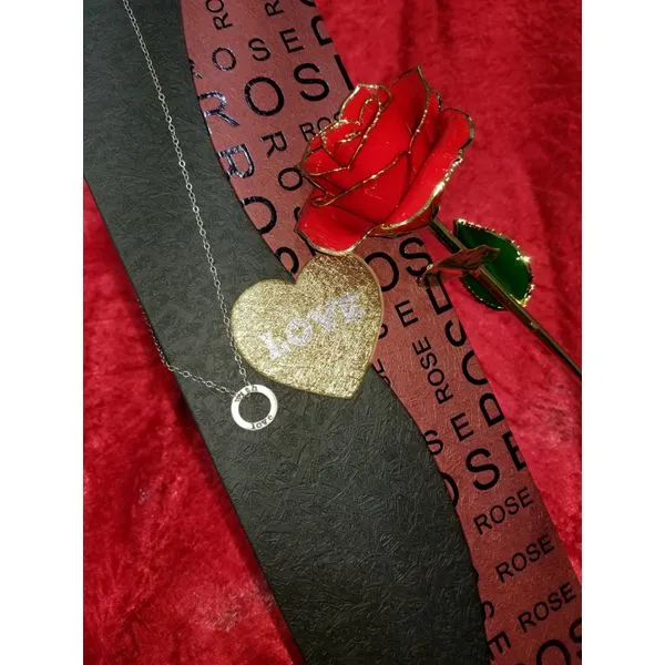 Red Rose lacquered and 24kt gold tipped with a sterling silver eternity circle engraved 