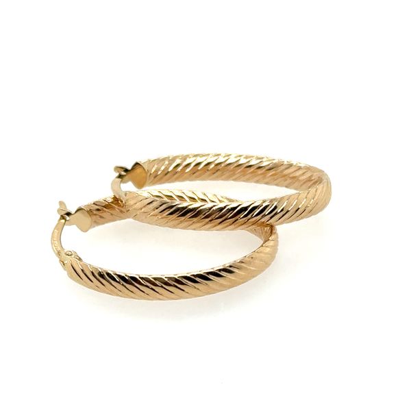 Textured Oval Hoop Earrings Tom Cook Jeweler, Inc. Daytona Beach, FL