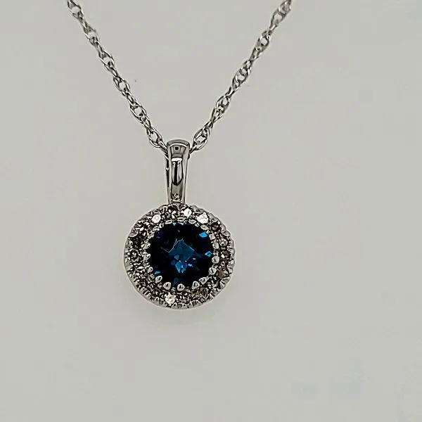 BLUE TOPAZ PENDANT | 14 KARAT WHITE GOLD | BLUE TOPAZ AND DIAMOND Van Scoy Jewelers Wyomissing, PA