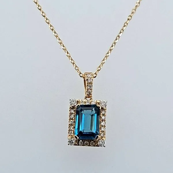 Radiant Blue Topaz Beauty: 14 Karat Yellow Gold Pendant w...