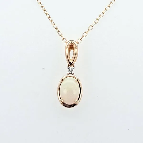 Gleaming Opulence: 14 Karat Yellow Gold Opal and Diamond ...