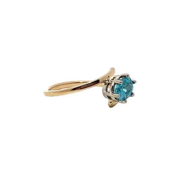 6.75, 14k YG Oval Blue Topaz Bypass Ring Image 2 Vaughan's Jewelry Edenton, NC