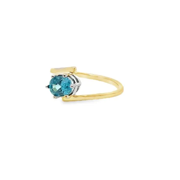 6.75, 14k YG Oval Blue Topaz Bypass Ring Image 3 Vaughan's Jewelry Edenton, NC