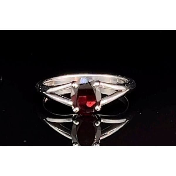 10k WG 1.5CT Oval Garnet Open Shank Ring Vaughan's Jewelry Edenton, NC