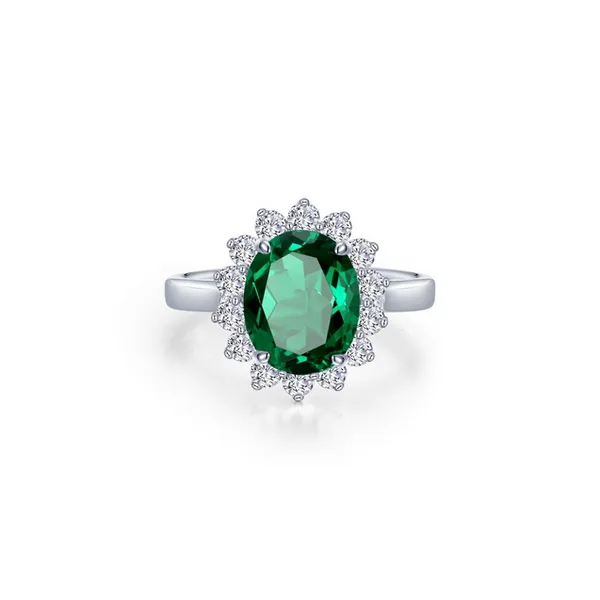 7, SS 3.1CTTW Sunburst Simulated Oval Halo Emerald Vaughan's Jewelry Edenton, NC